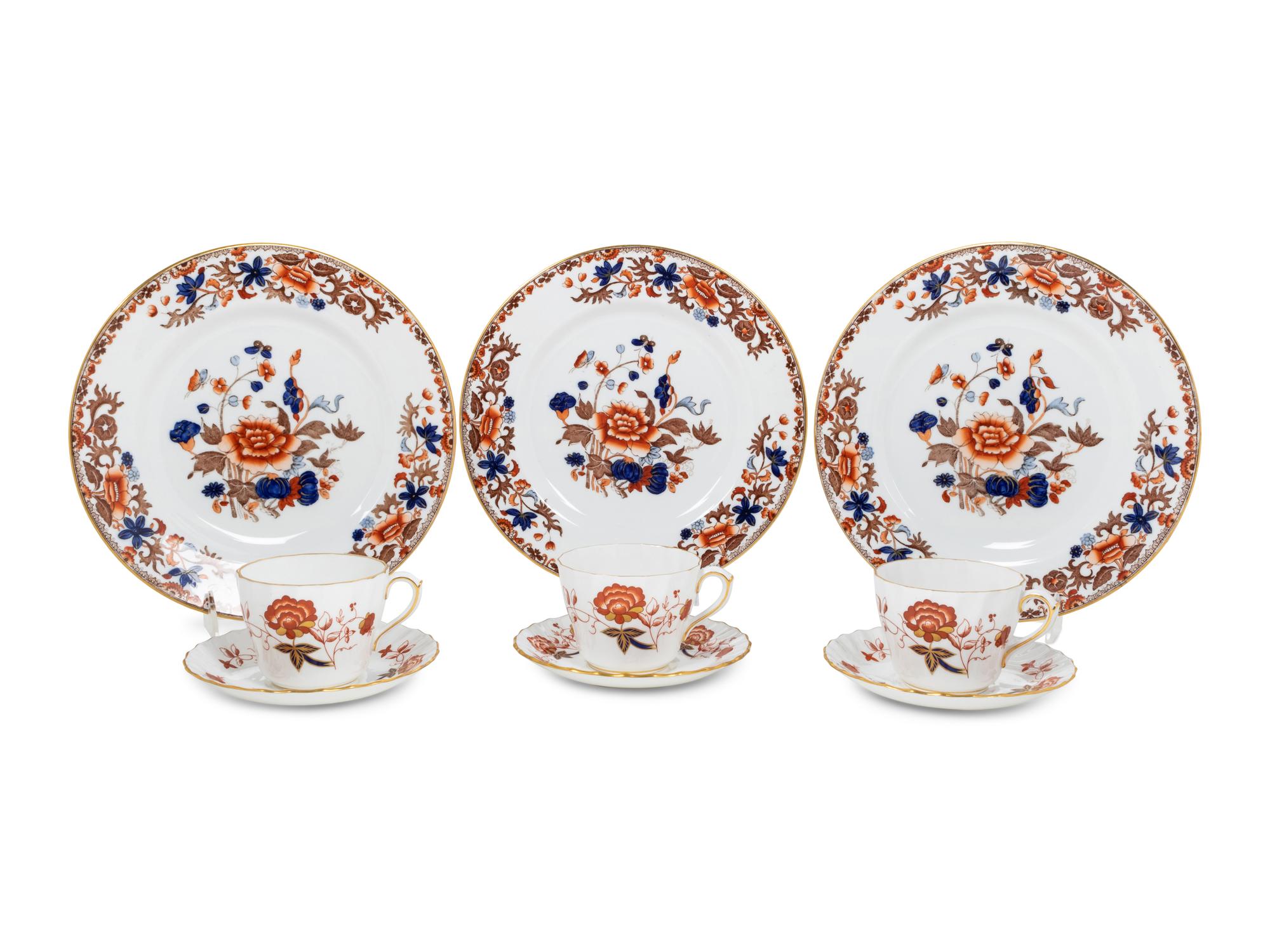 A Set of Twelve Spode Dinner Plates and a Similar Set of Royal Crown Derby Cups and Saucers