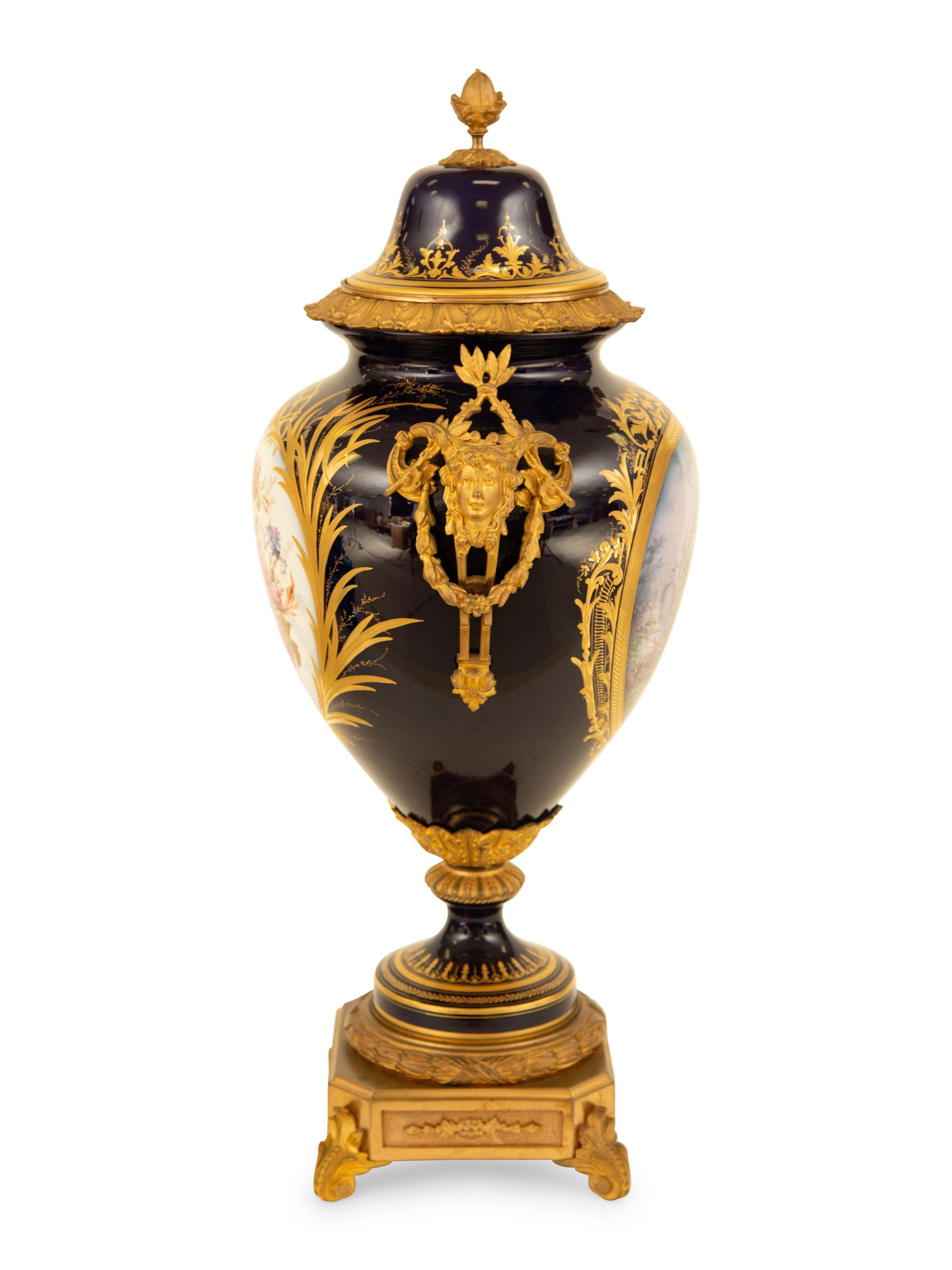 A Sèvres Style Gilt Metal Mounted Porcelain Urn and Cover