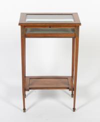 A Continental Hardwood Vitrine Table, Height 28 1/2 x width 17 3/4 x depth 11 7/8 inches.