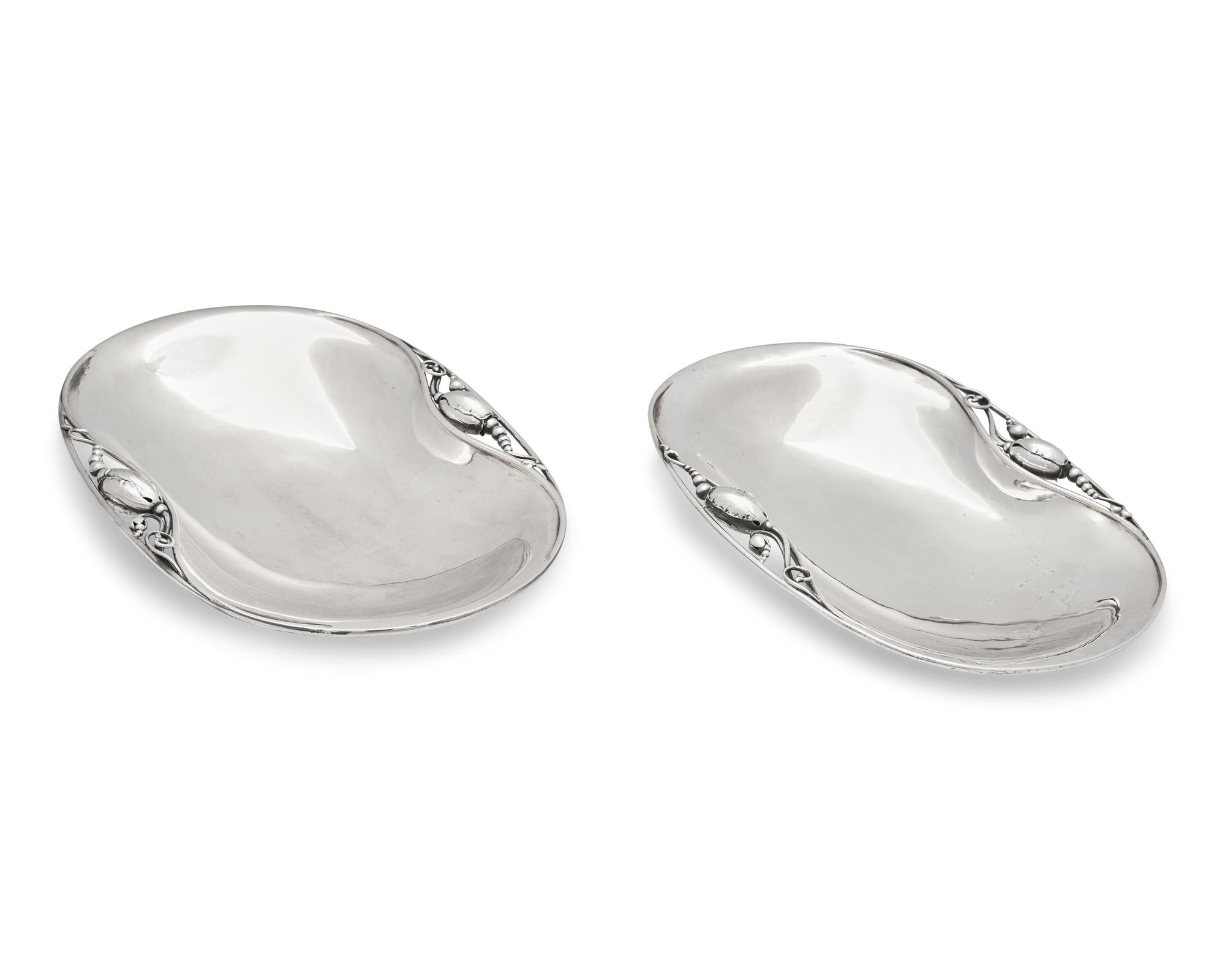 A Matched Pair of Georg Jensen Silver Blossom Pattern Dishes