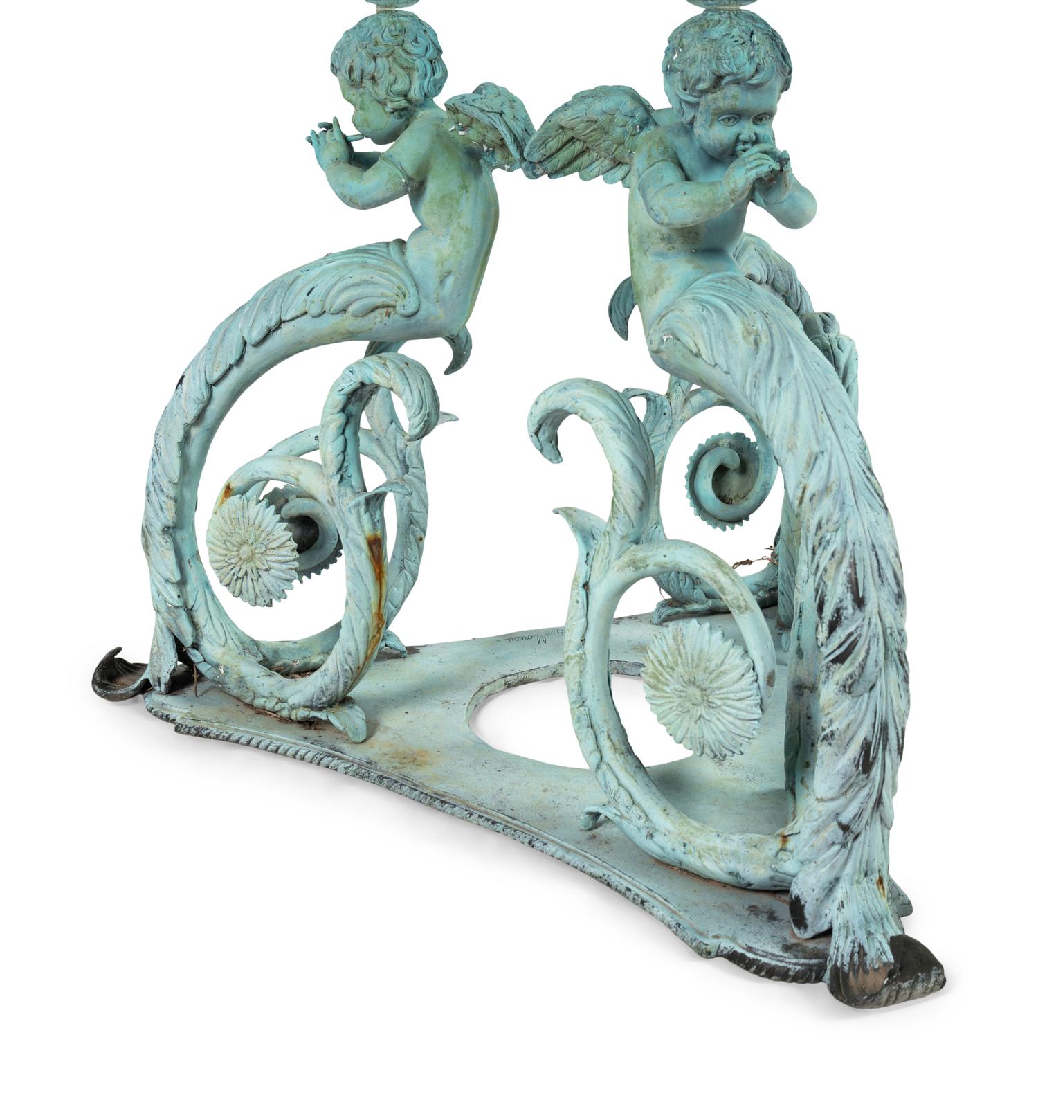 A Patinated Bronze and Glass Garden Table