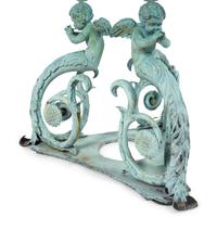 A Patinated Bronze and Glass Garden Table