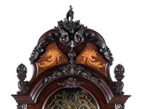 A Victorian Carved Mahogany and Marquetry Nine-Tube Tall Case Clock