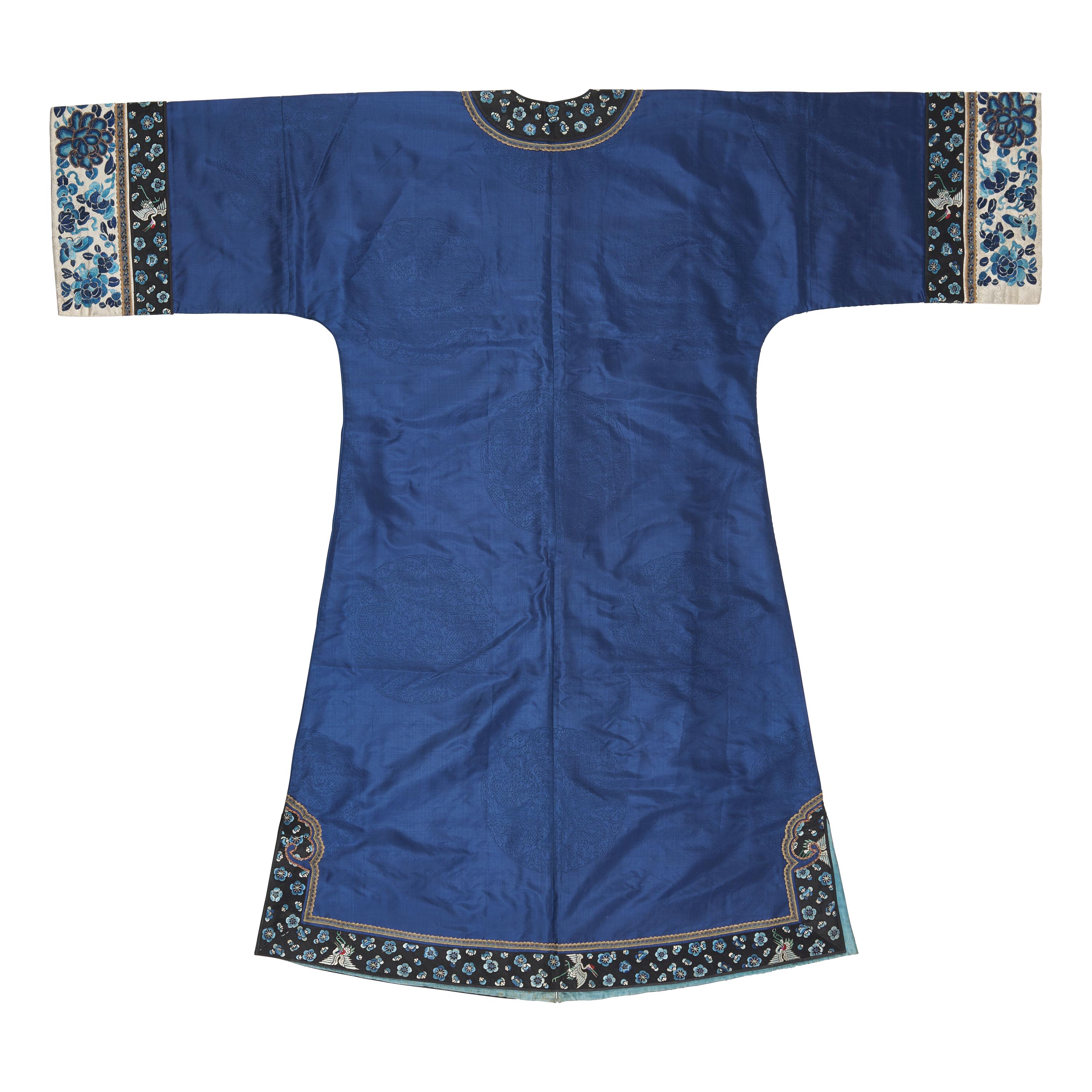 A Chinese Blue Silk Lady's Jacket, Late 19th-Early 20th Century 晚清-民國 藍地團龍紋鑲仙鶴梅花邊女褂