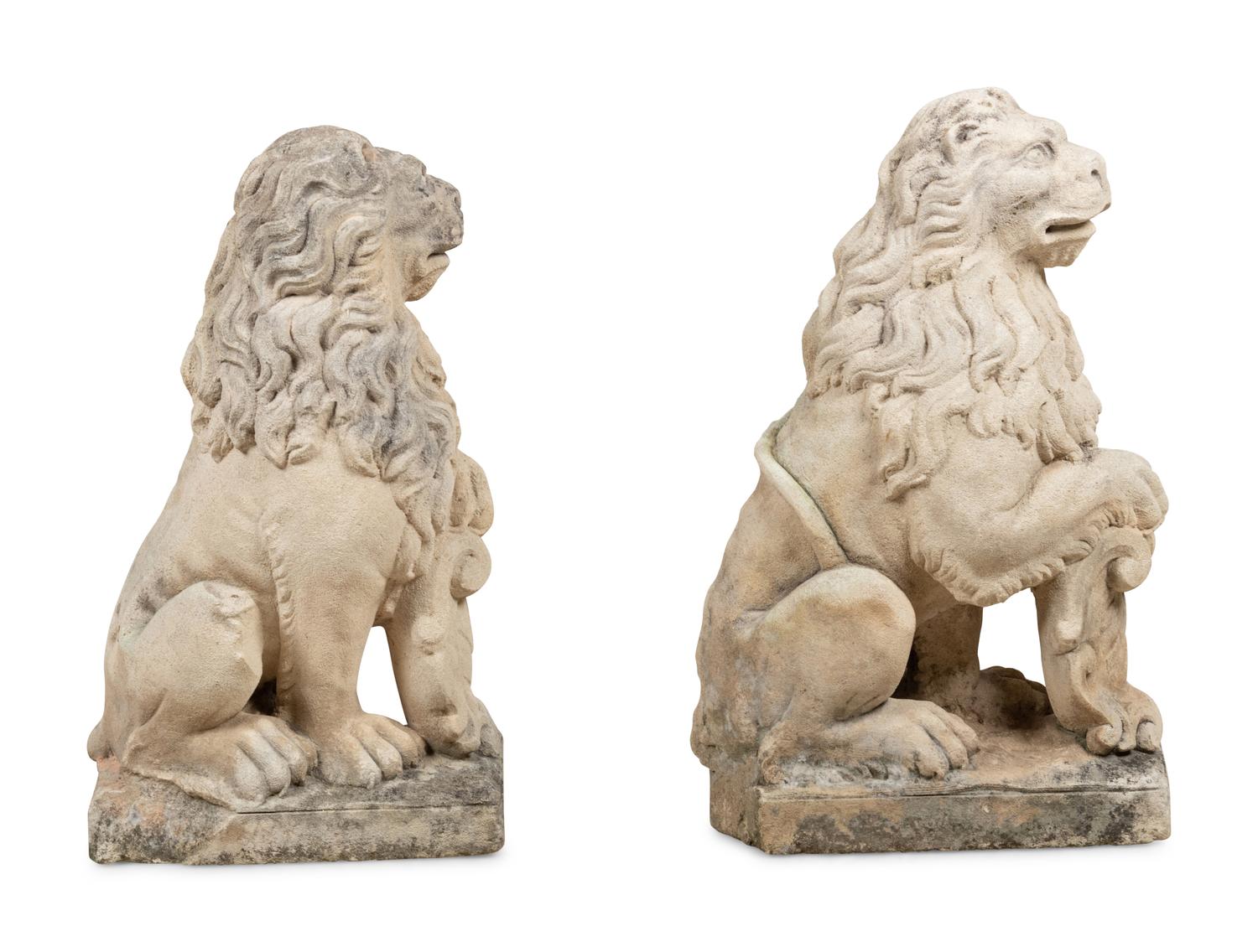 A Pair of Cast Stone Model Lions