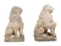 A Pair of Cast Stone Model Lions