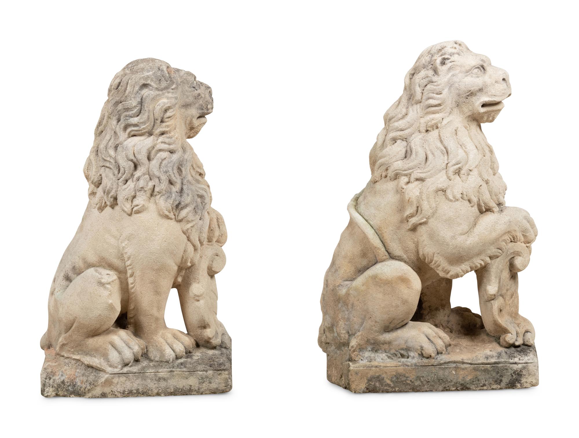 A Pair of Cast Stone Model Lions