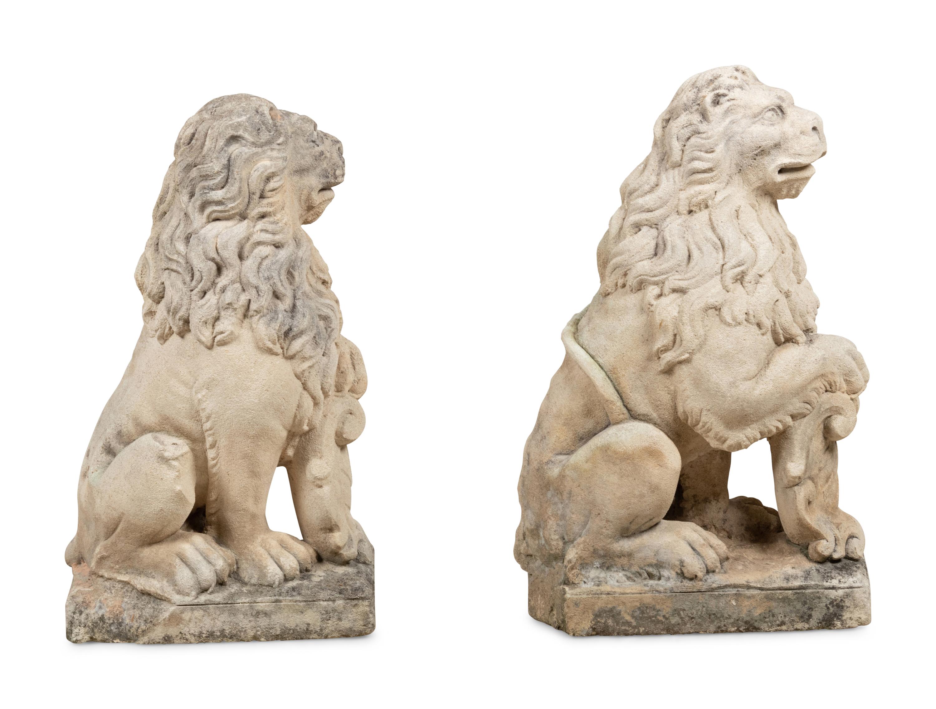 A Pair of Cast Stone Model Lions
