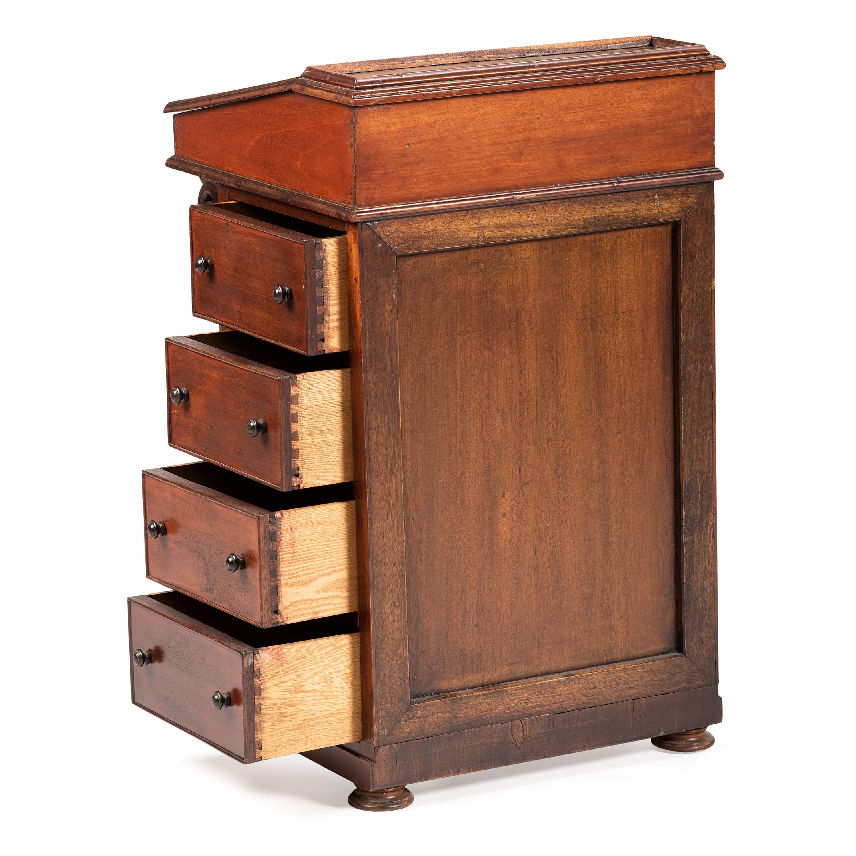 A Victorian Carved Mahogany Davenport Desk