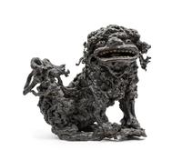 A Chinese Carved Lychee Wood Figure of a Fu Lion Height 13 1/2 inches. — 19TH CENTURY