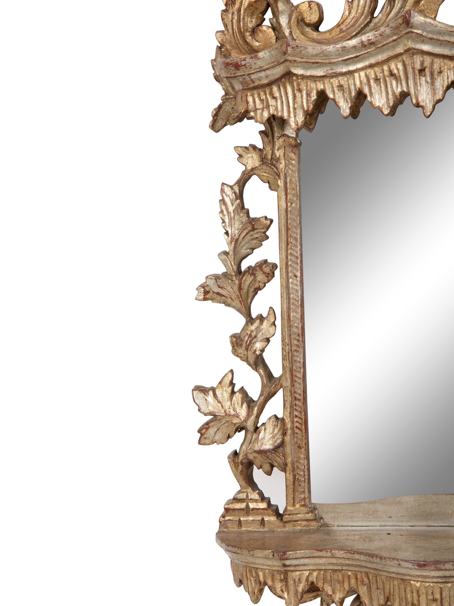 An Venetian Style Silvered Wood Grotto Mirror