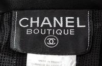 A Chanel Black Wool Pleated Suit, Size 40.