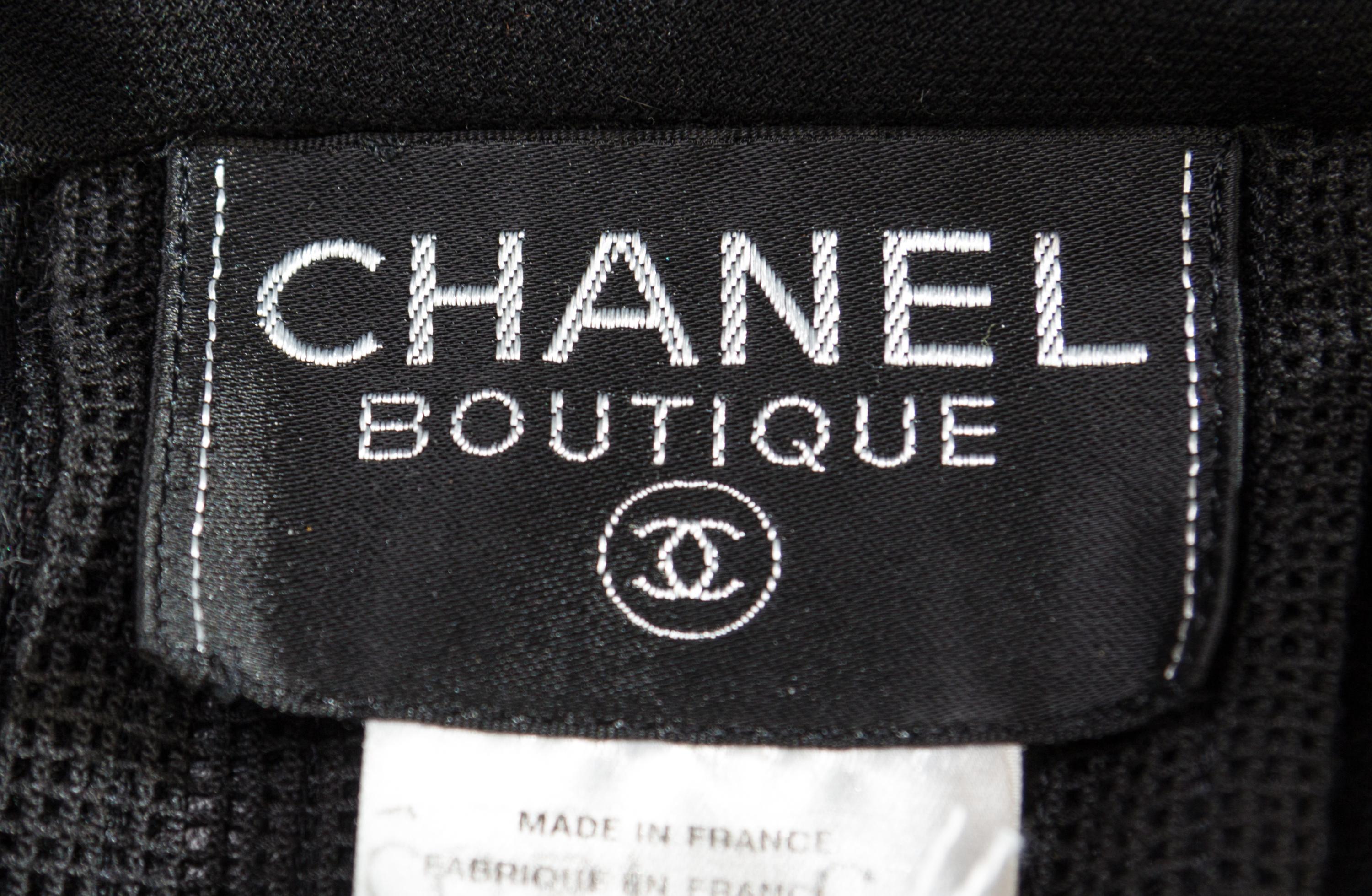 A Chanel Black Wool Pleated Suit, Size 40.