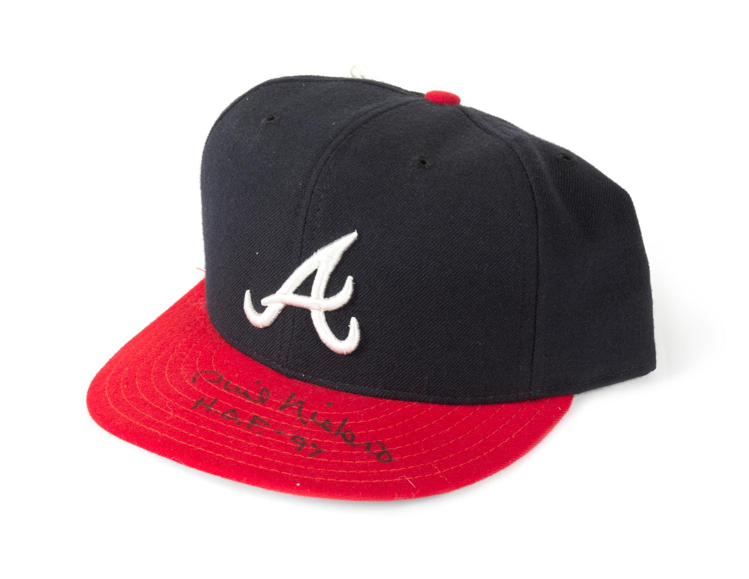A Phil Niekro Autographed Baseball Hat Height of display case 8 x width 9 1/2 x depth 10 inches.
