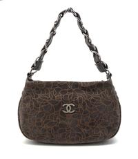 A Chanel Grey Suede Camellia Bag, 11 x 6 1/2 x 3 inches.