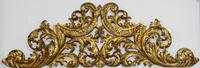 A Continental Giltwood Overdoor Panel