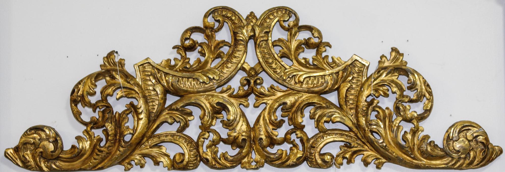 A Continental Giltwood Overdoor Panel