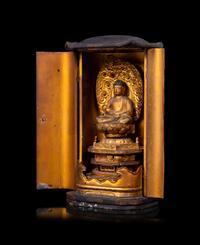 A Japanese Gilt Lacquered Figure of Buddha