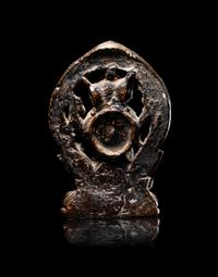 A Rare Tibetan Bronze Figure of Red Jambhala