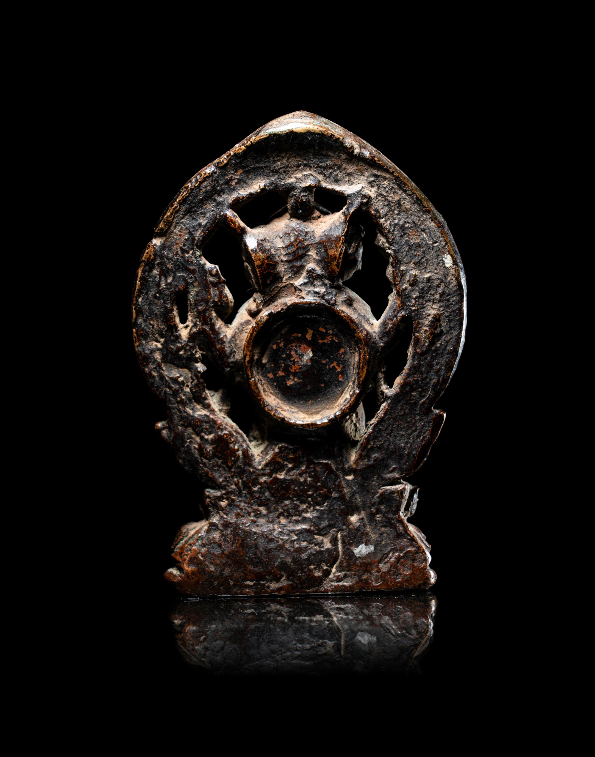 A Rare Tibetan Bronze Figure of Red Jambhala