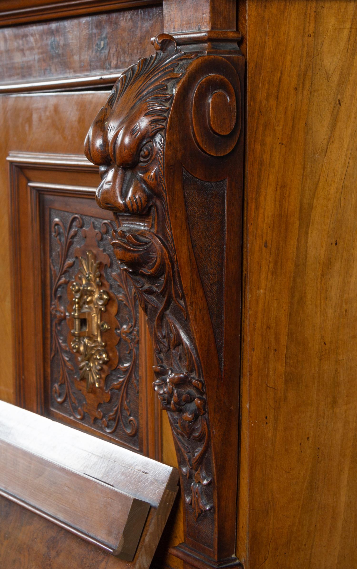 A German Carved Walnut Upright Player Piano and Upholstered Bench