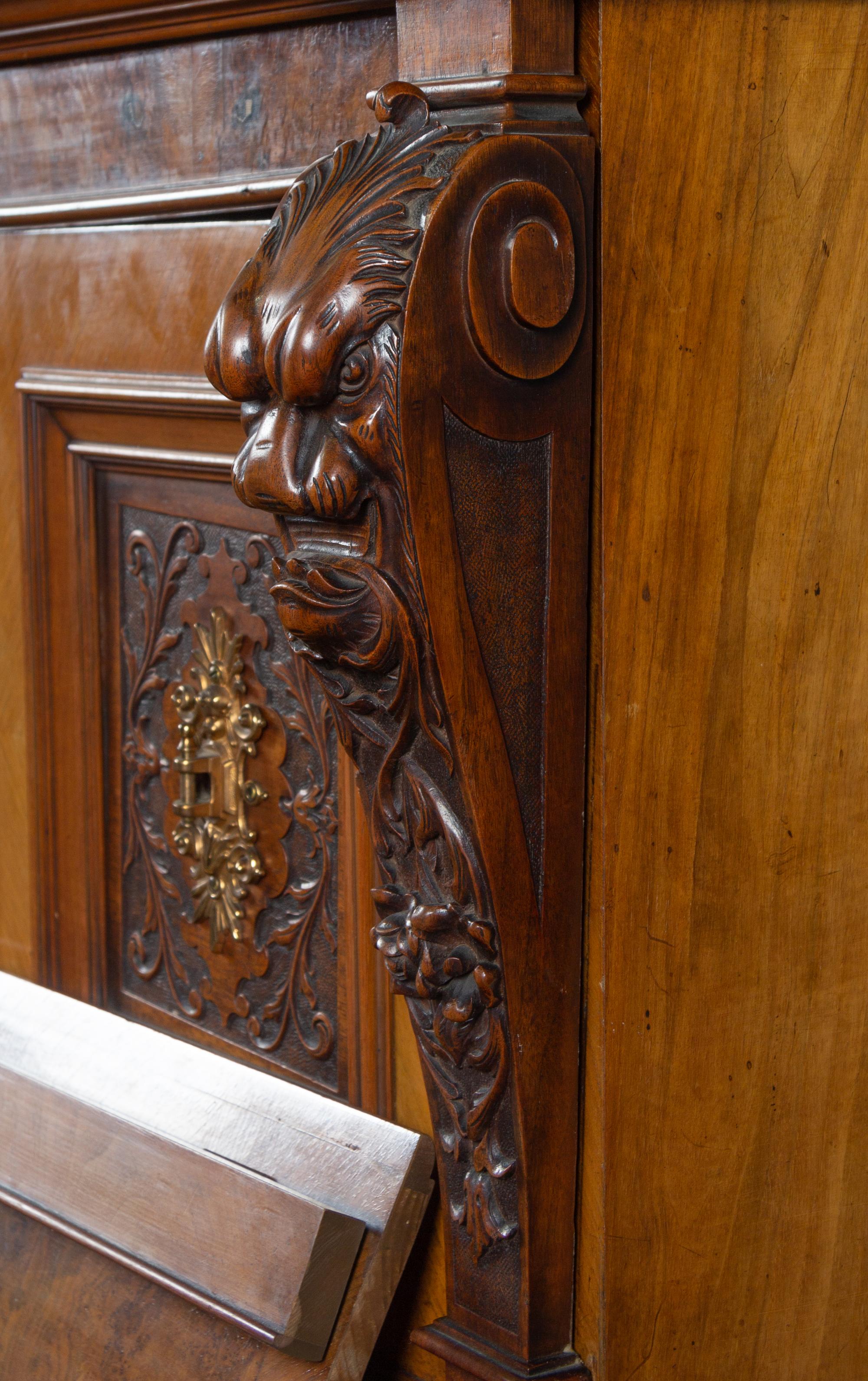 A German Carved Walnut Upright Player Piano and Upholstered Bench