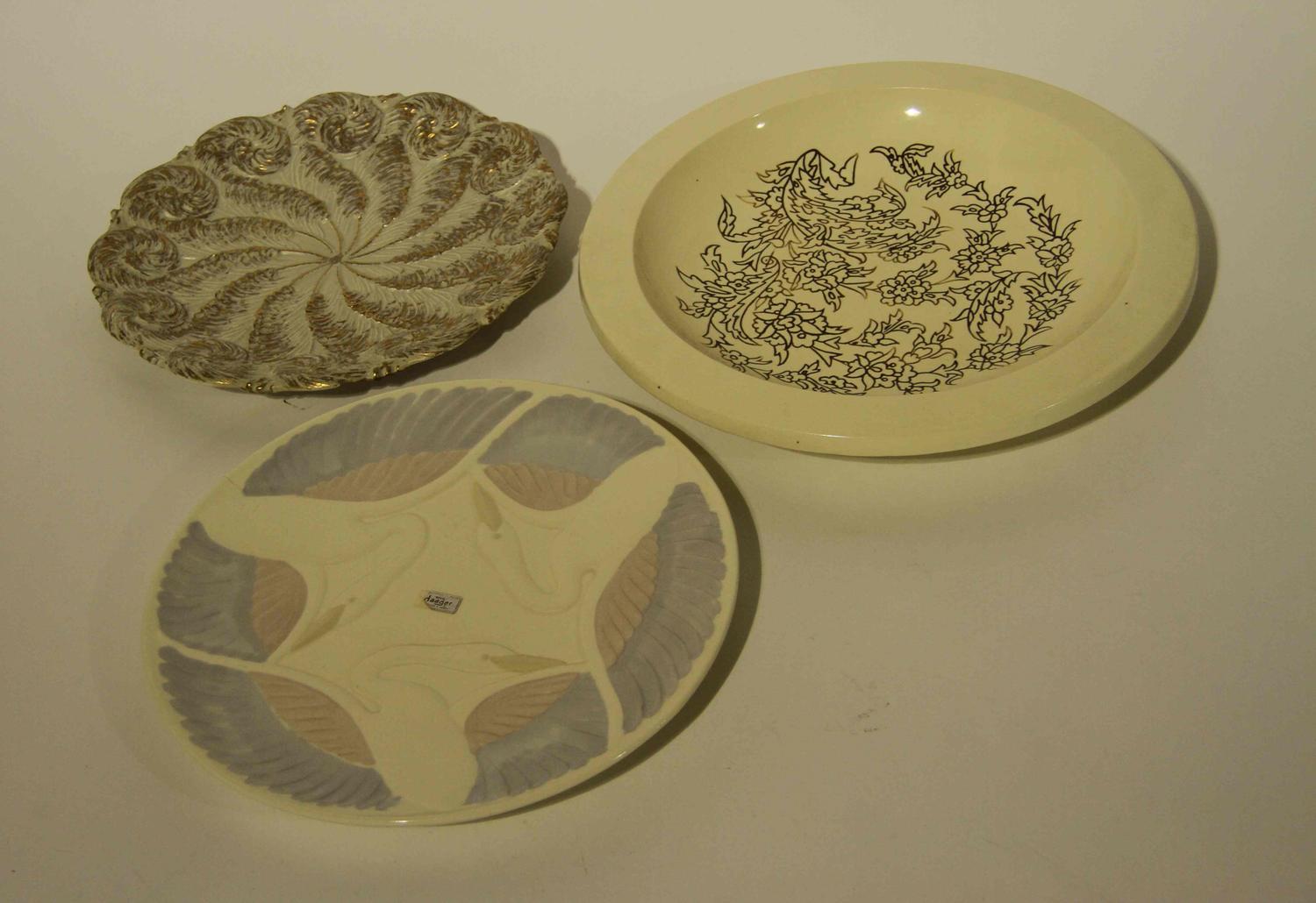 A Group of Eight Haeger Pottery Chargers Diameter of largest 15 inches.