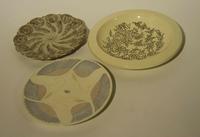 A Group of Eight Haeger Pottery Chargers Diameter of largest 15 inches.