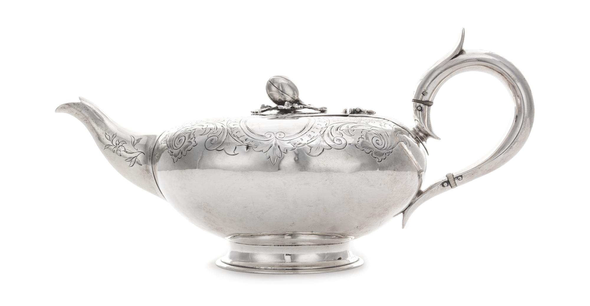 A Victorian Silver Teapot, George John Richards, London, 1865, of squat form, having a gourd finial surmounting a C-scroll, floral and