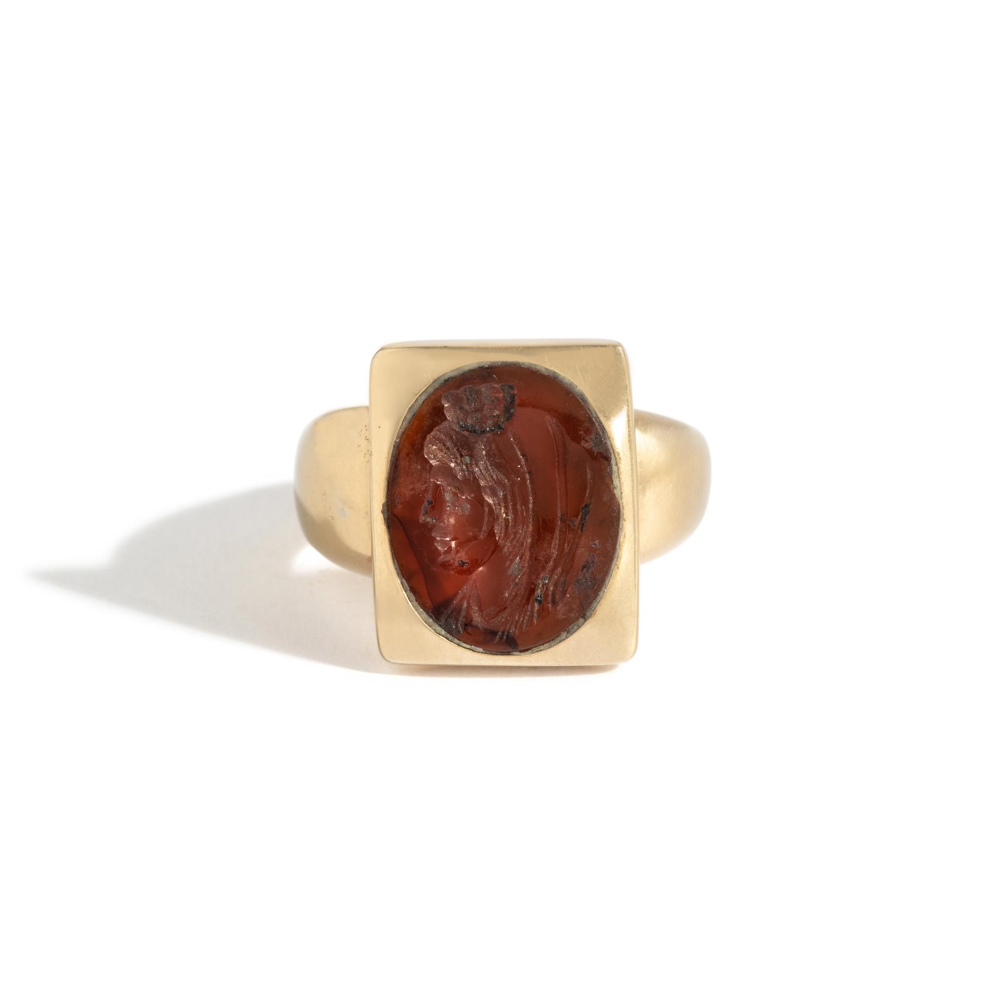 A Roman Carnelian Ring Stone with the Goddess Isis — Set in a gold ring