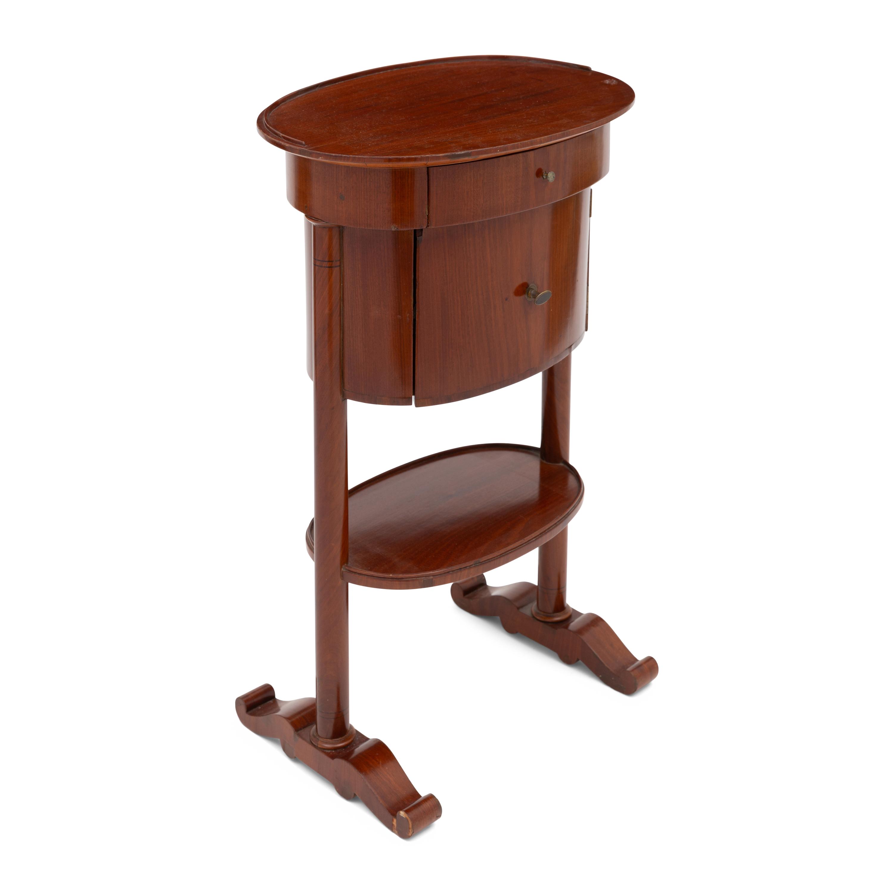 An Empire Style Mahogany Drum Table