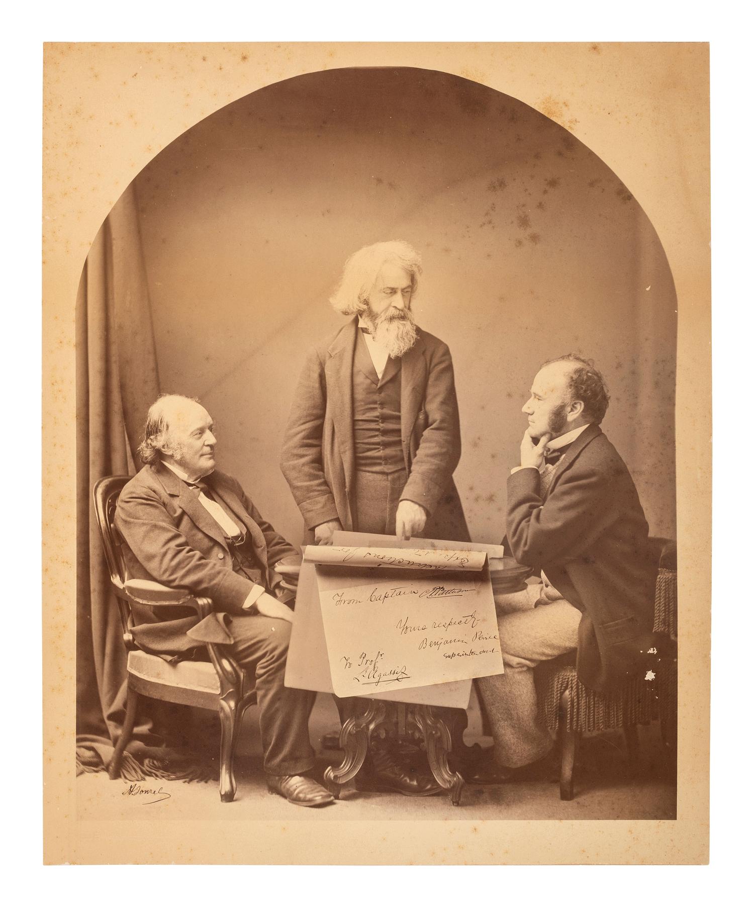Louis Agassiz SONREL, Antoine, photographer. Signed mammoth plate photograph of Louis Agassiz, Benjamin Peirce, and Carlile Patterson. Ca 1871.