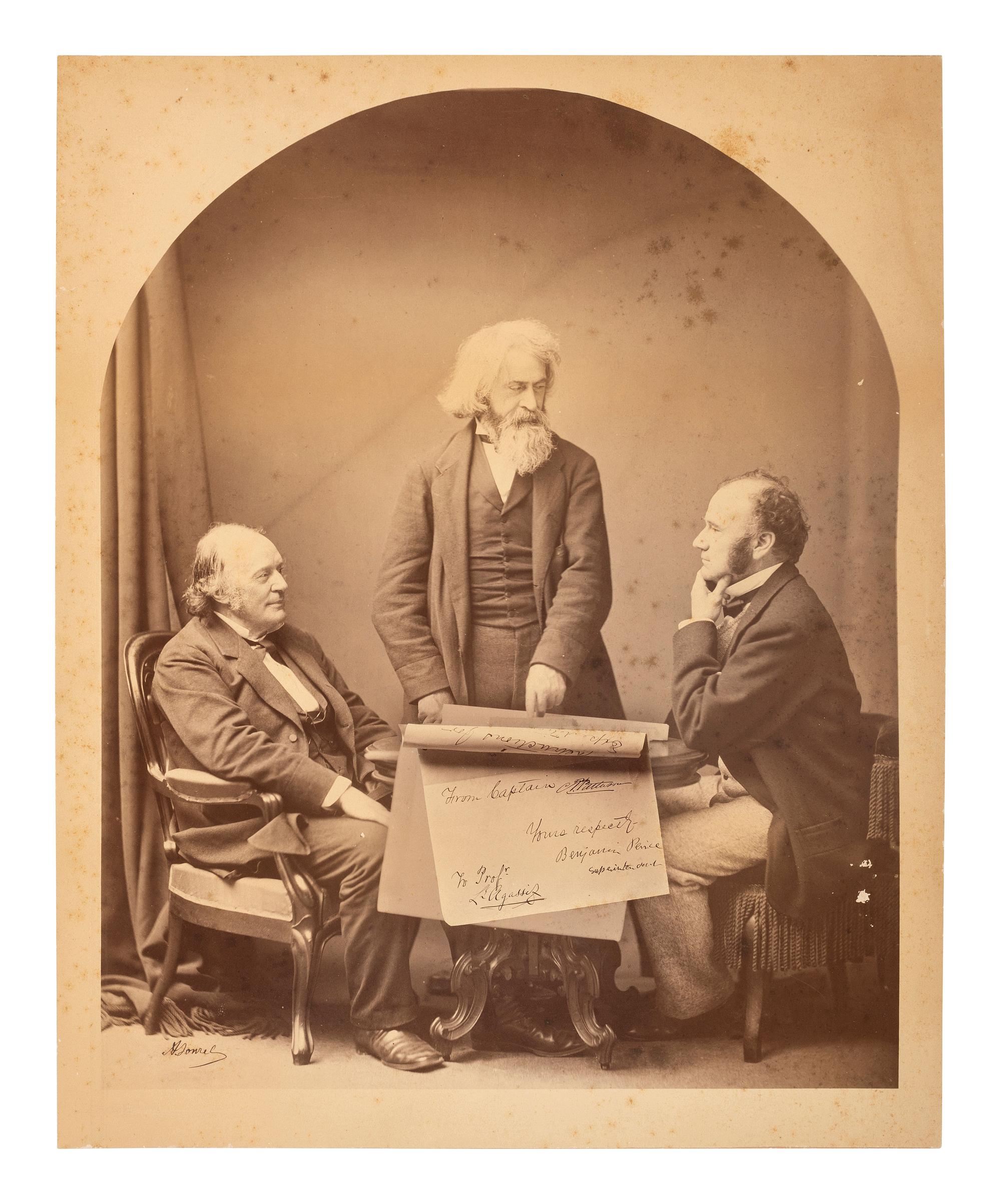 Louis Agassiz SONREL, Antoine, photographer. Signed mammoth plate photograph of Louis Agassiz, Benjamin Peirce, and Carlile Patterson. Ca 1871.