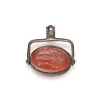 A Roman Carnelian Scaraboid with a Muse — Set in a silver swivel pendant