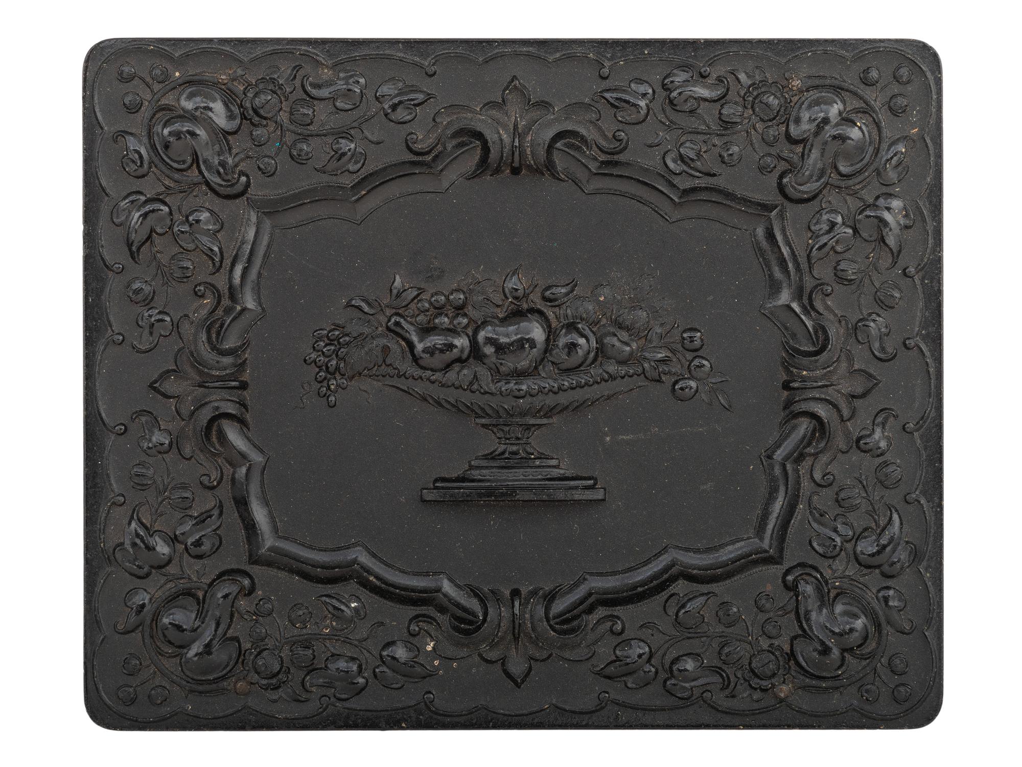 [EARLY PHOTOGRAPHY]. Half plate daguerreotype featuring a gentleman and his sleeping canine companion.
