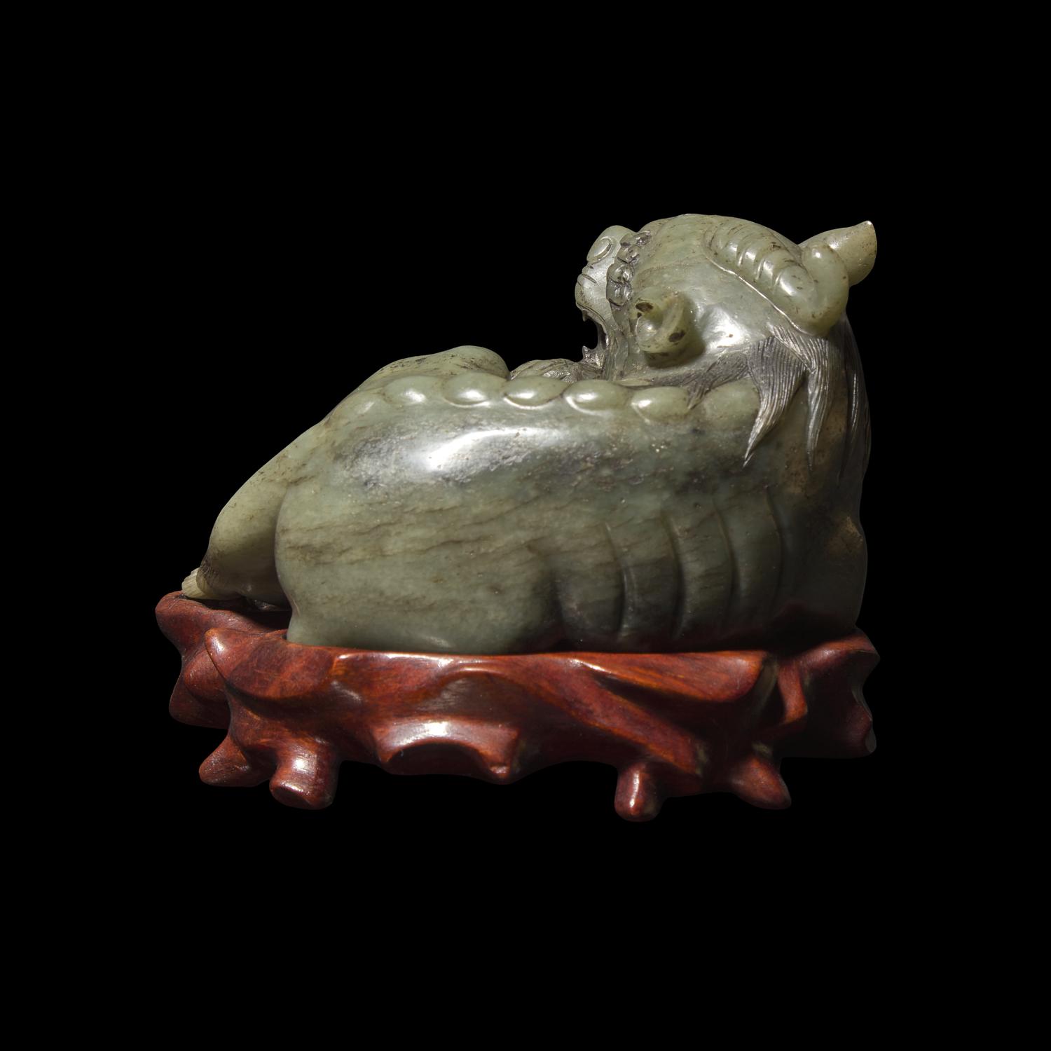 A Chinese Carved Sage Green Jade Mythical Beast, Bixie 青玉辟邪