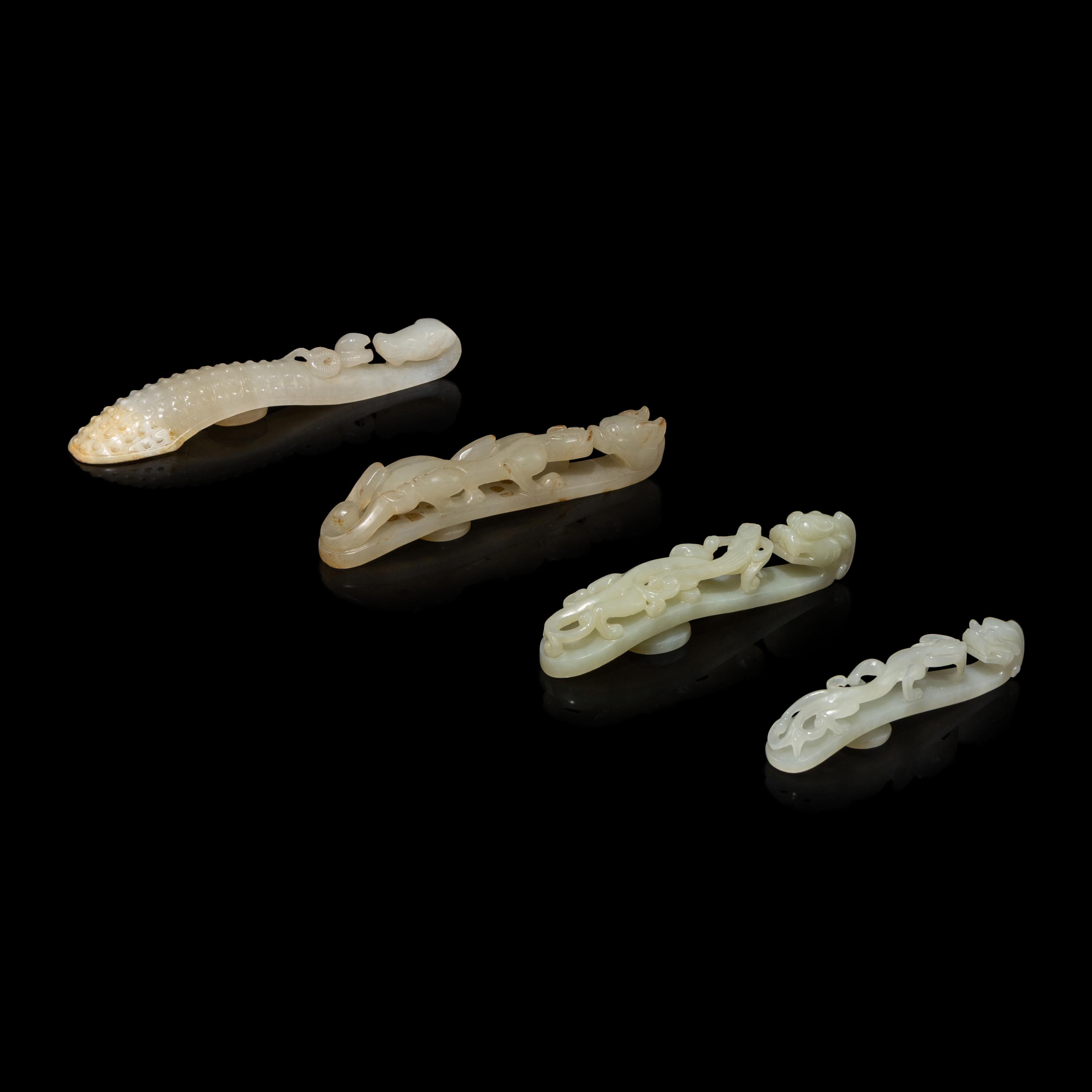Four Chinese Pale Celadon Jade 'Dragon' Belt Hooks, Daigou — 青白玉龍鈎四枚