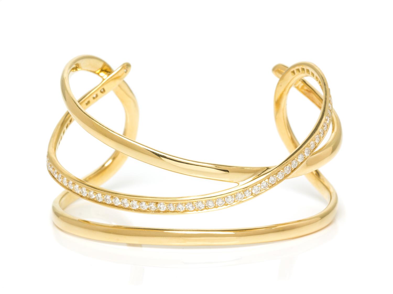 An 18 Karat Yellow Gold and Diamond Cuff Bracelet, Angela Cummings for Tiffany & Co., Circa 1980, 25.25 dwts.