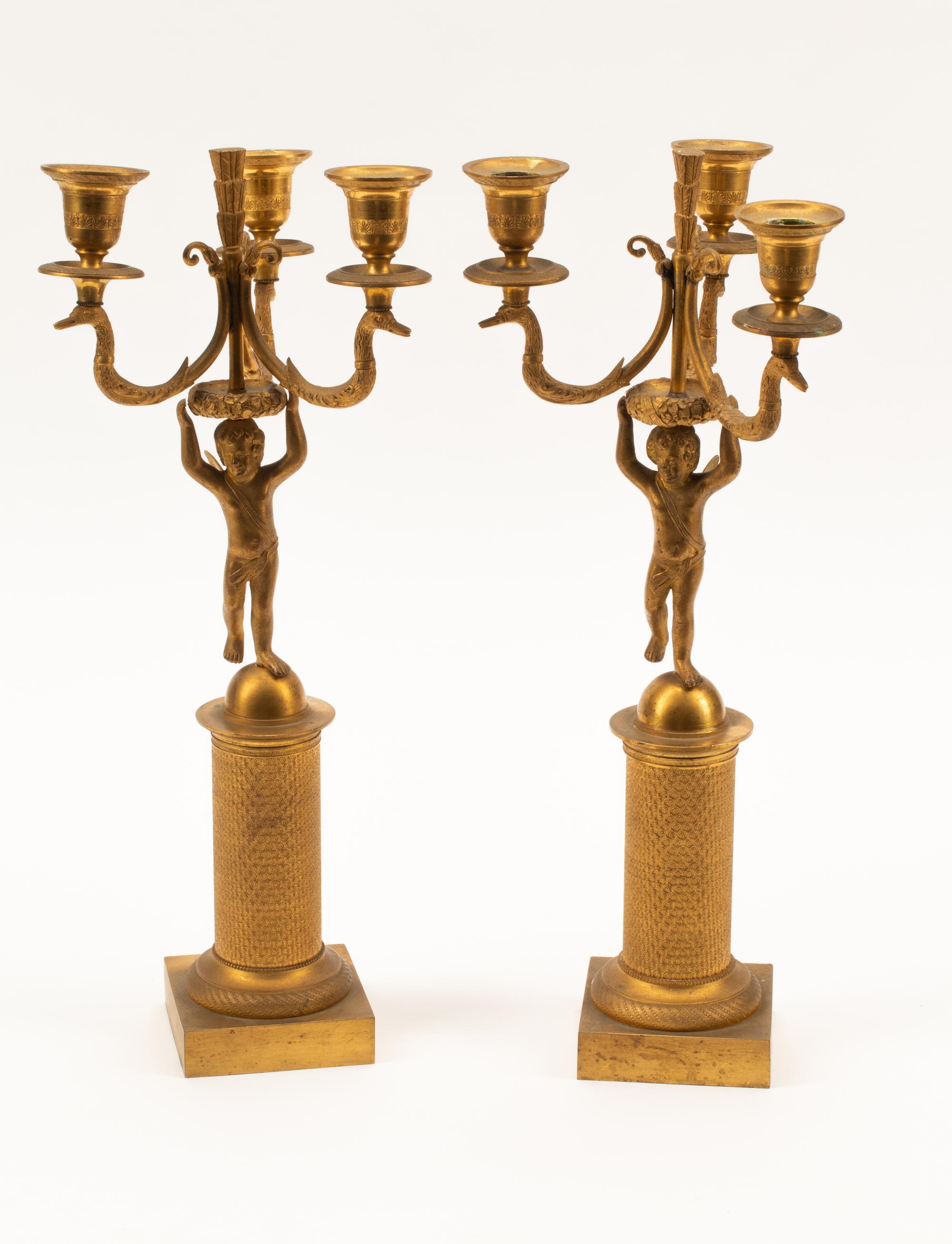 A Pair of Charles X Gilt Bronze Three-Light Candelabra