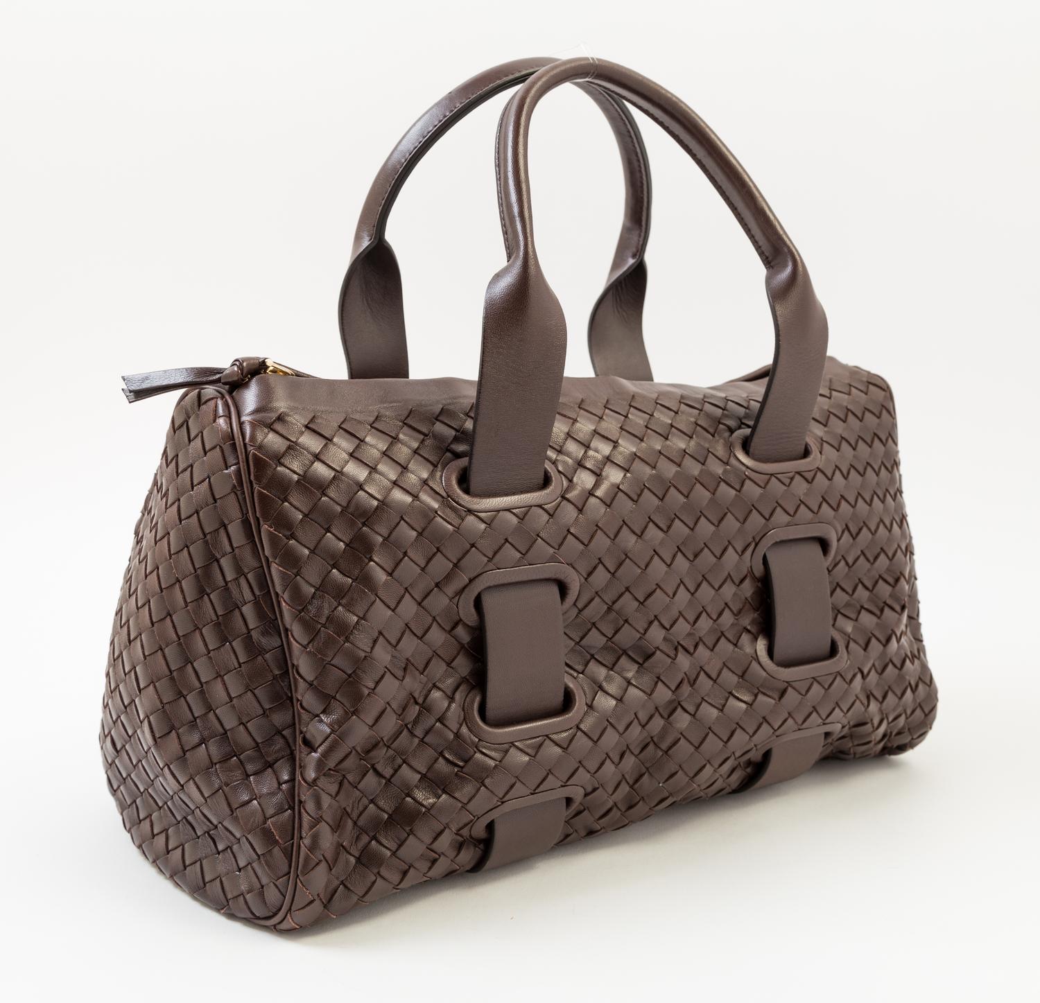 A Bottega Veneta Chocolate Intrecciato Small Duffle Bag, 14" x 9" x 7"; Handle Drop: 6".