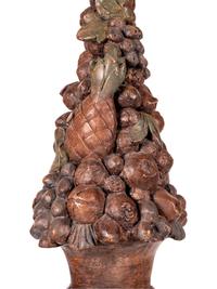A Pair of Italian Baroque Style Painted Terra Cotta and Carved Wood Pedestals