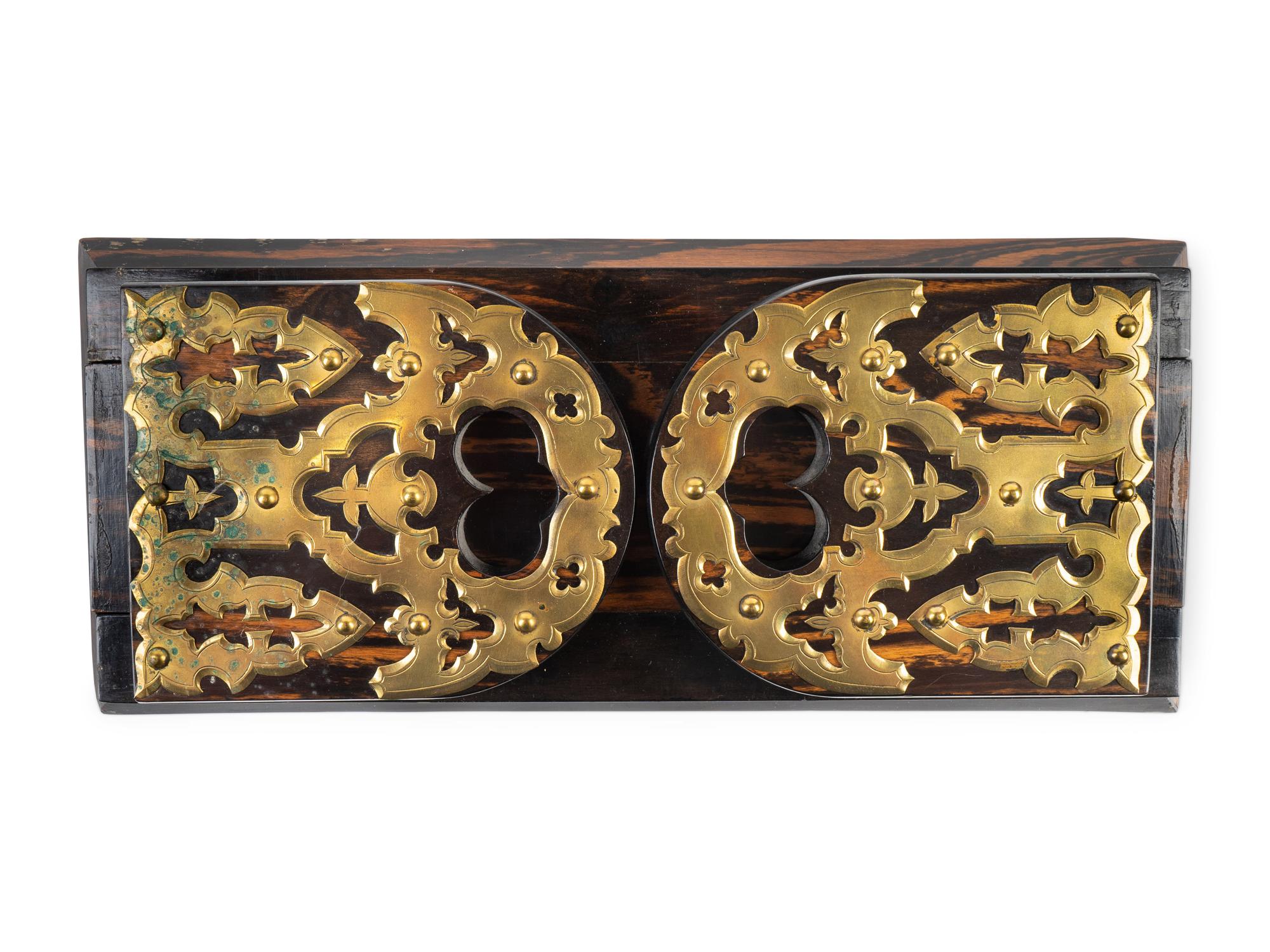 A Victorian Brass Mounted Coromandel Sliding Desk Top Book Shelf — 19TH CENTURY