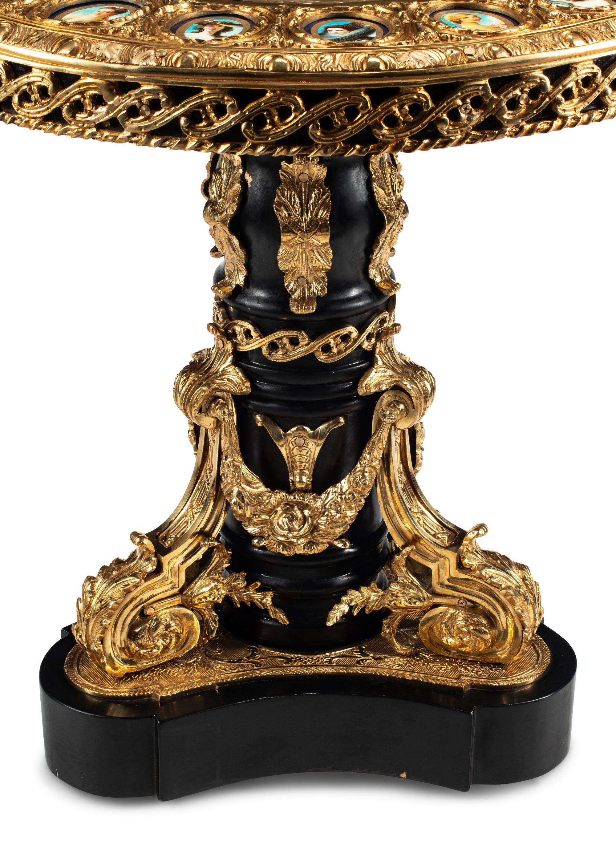A Louis XV Style Porcelain Mounted Gilt Bronze Center Table