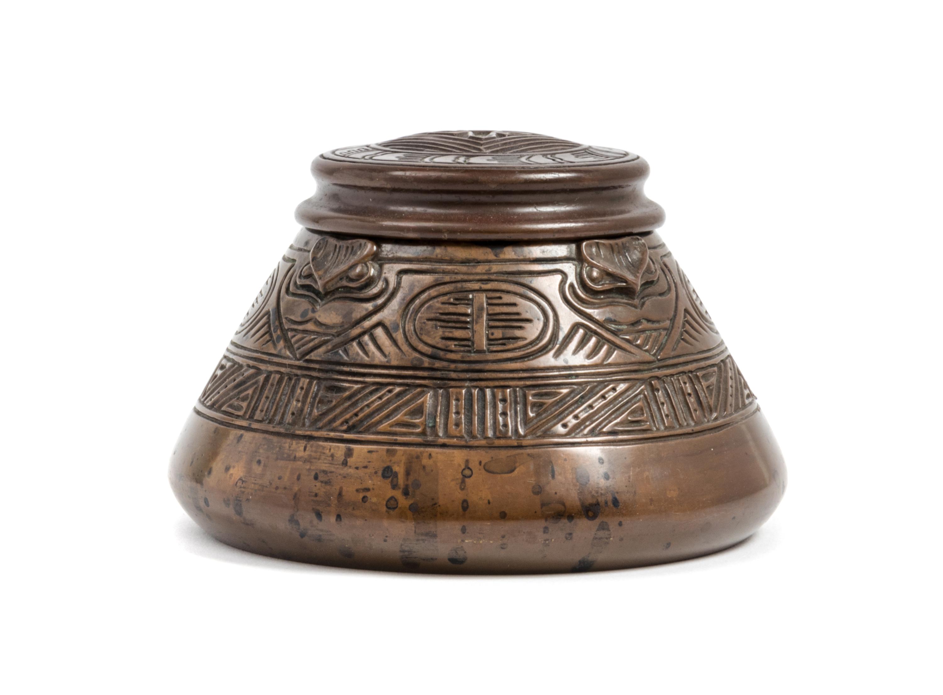 Tiffany Studios, EARLY 20TH CENTURY, an American Indian pattern bronze inkwell, (1183)
