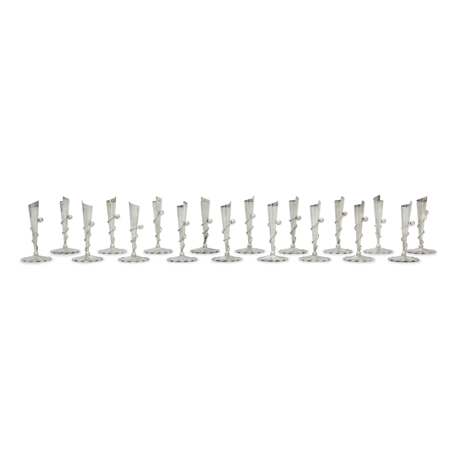 A Set of Eighteen Peruvian Silver Tapersticks