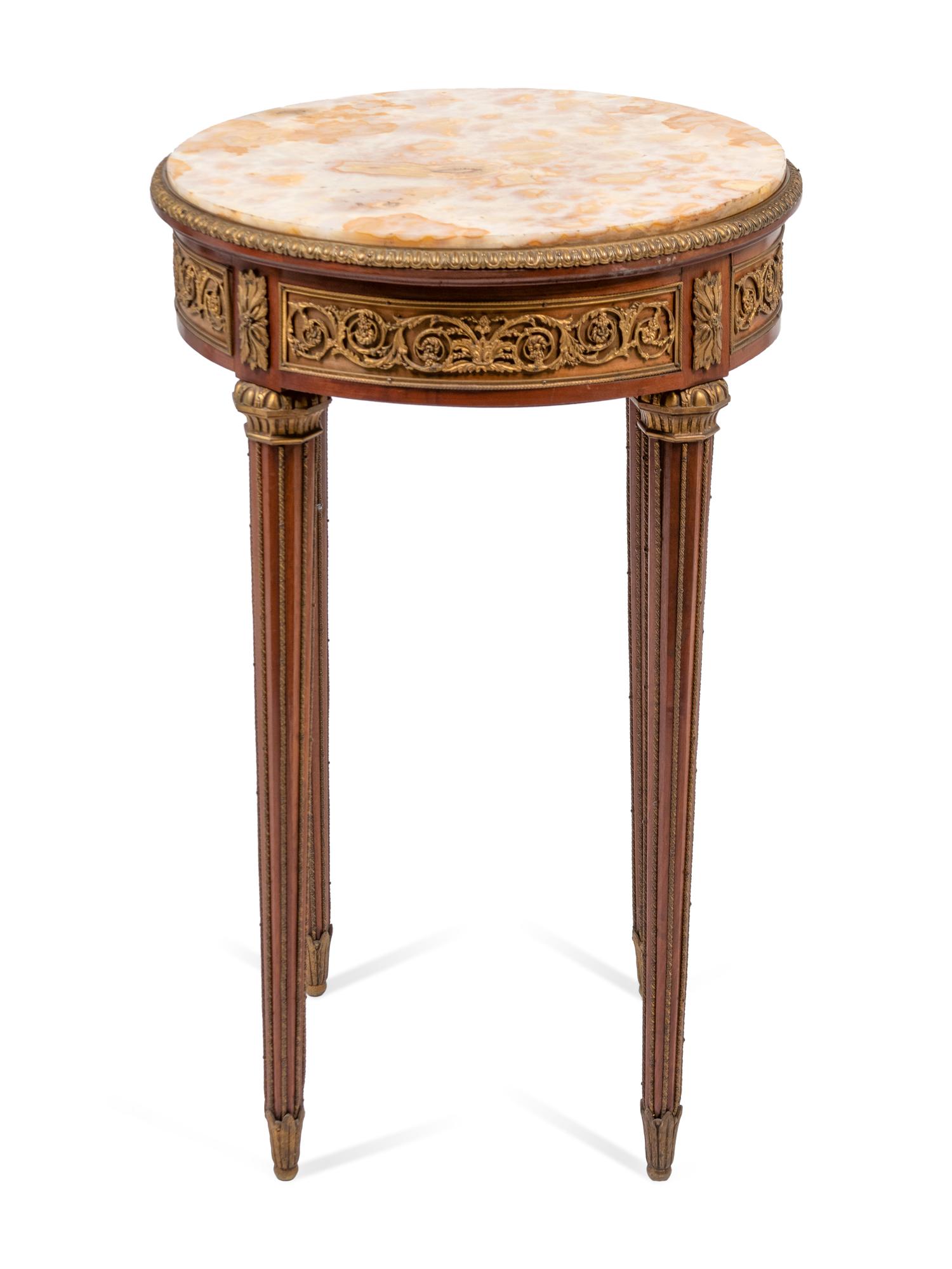A Louis XVI Style Gilt-Bronze Mounted Mahogany Onyx-Top Side Table