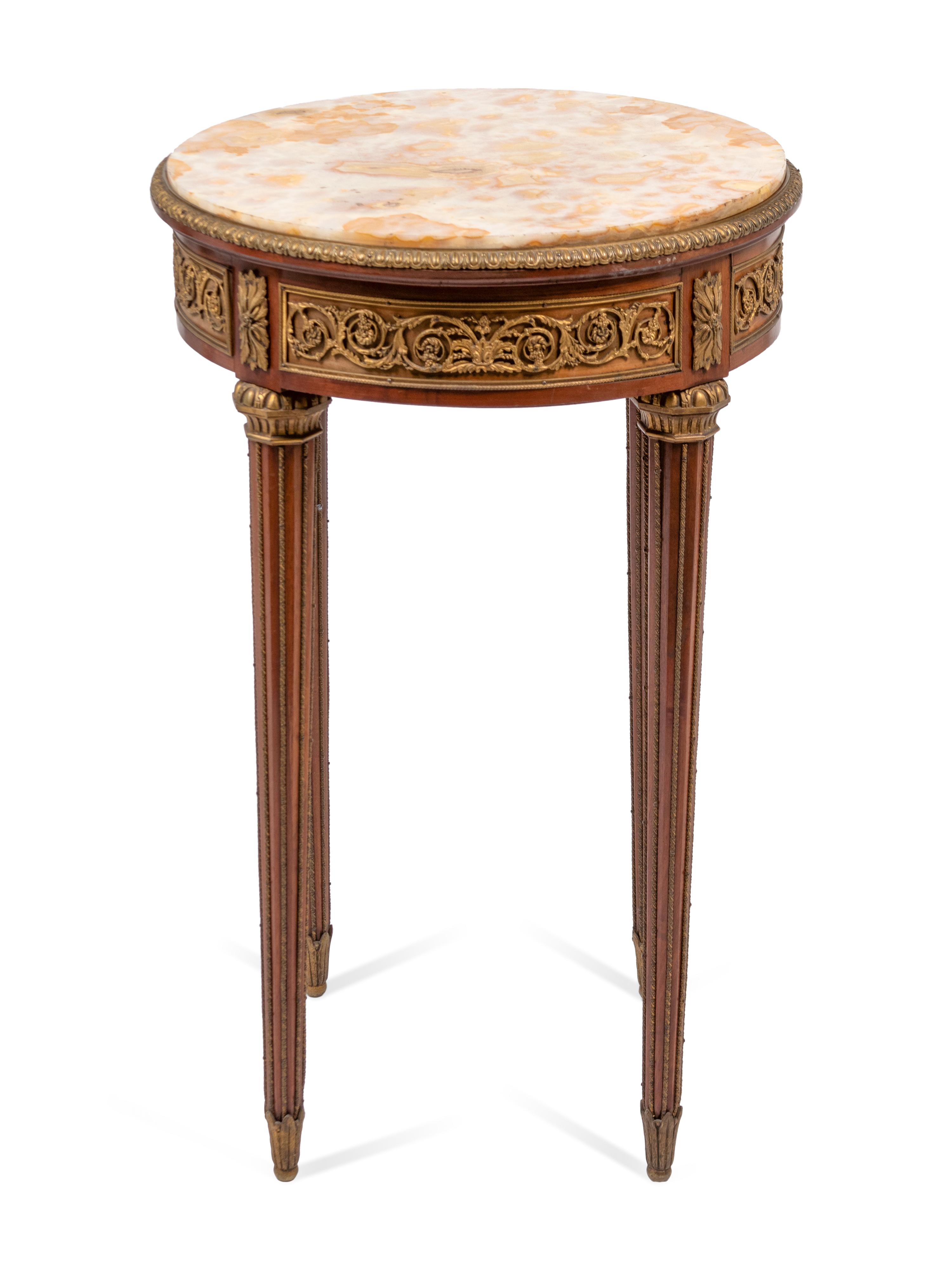 A Louis XVI Style Gilt-Bronze Mounted Mahogany Onyx-Top Side Table