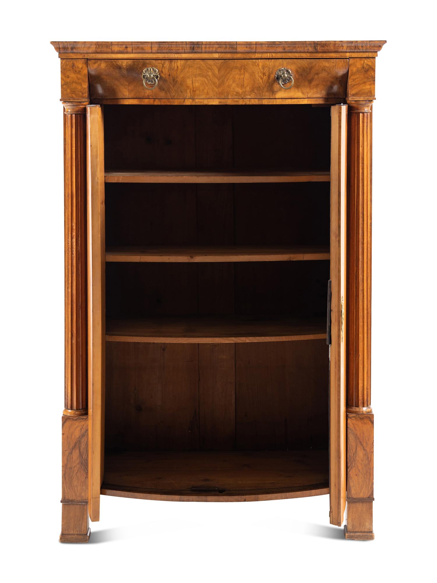 A Biedermeier Figured Walnut Cabinet
