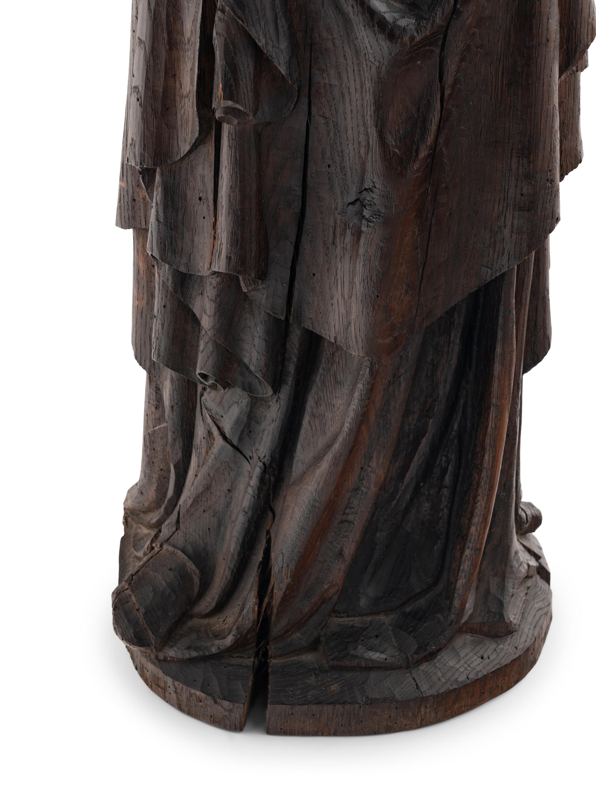 A Carved Oak Figural Group of the Madonna and Child