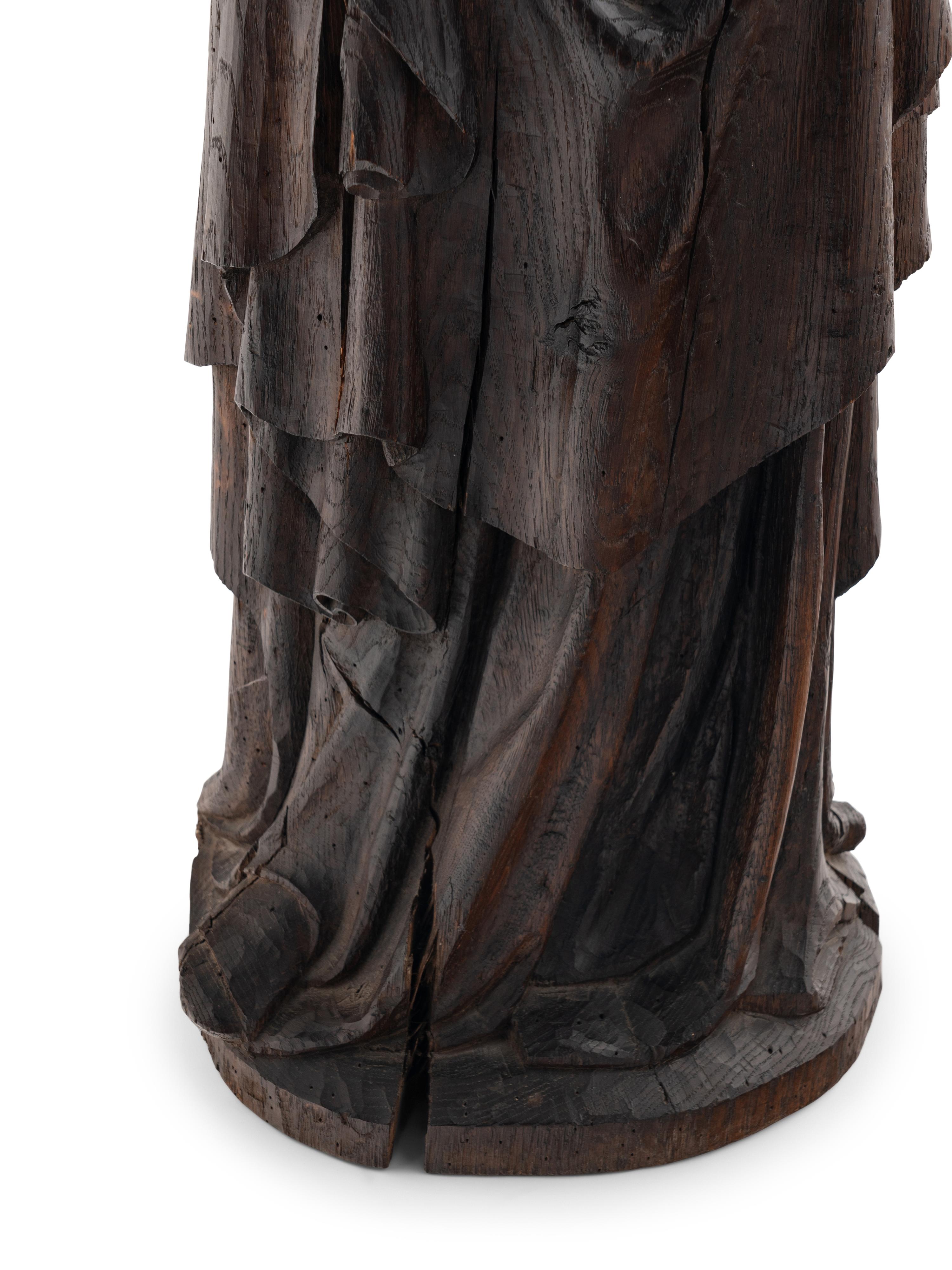 A Carved Oak Figural Group of the Madonna and Child